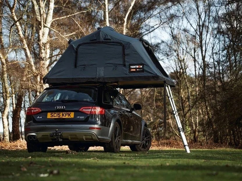 Casavibeo TentBox Lite XL roof top tent set up on a vehicle, showcasing its compact design and durable fabric for outdoor camping.
