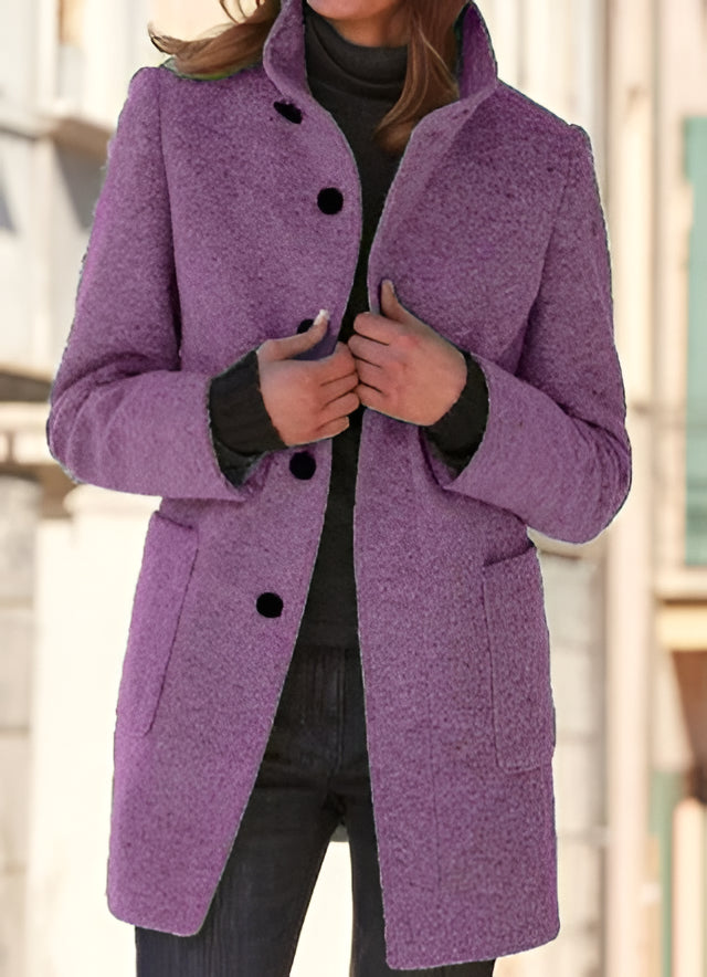 Belro elegant wool coat displayed on a hanger, showcasing its classic design and tailored fit for stylish winter wear.