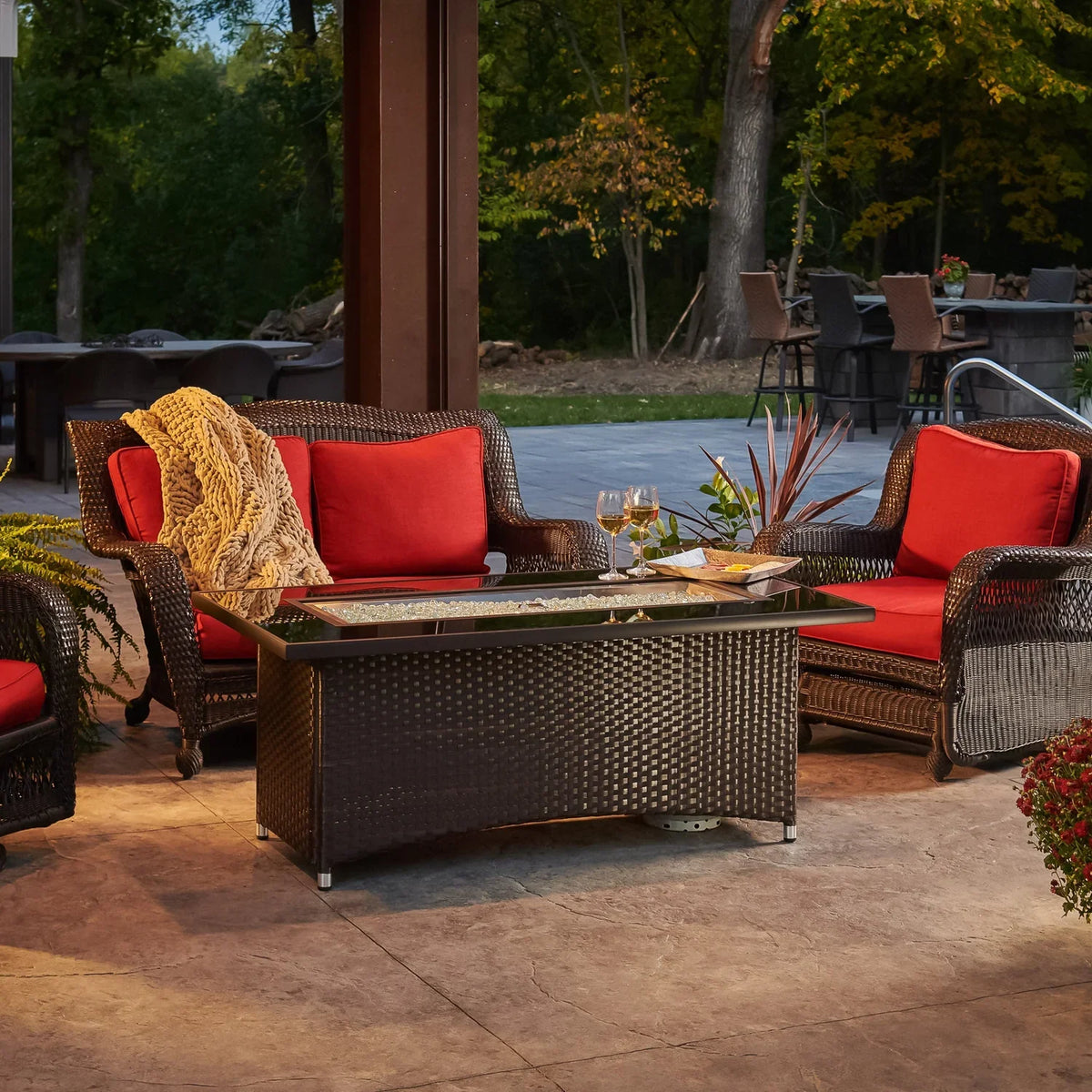 Casavibeo Montego Linear Gas Fire Pit Table with sleek black stone finish and modern design, featuring a built-in gas burner and decorative stones.