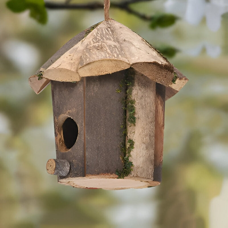 Wooden bird house with hut design, hanging cord, weatherproof finish, suitable for garden bird care by Mivoza.