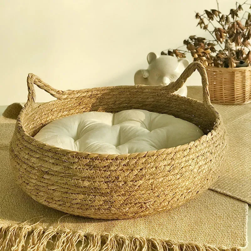Handmade woven Belro cat bed with a seasonal padded cushion, designed for cozy comfort in home and garden furniture.