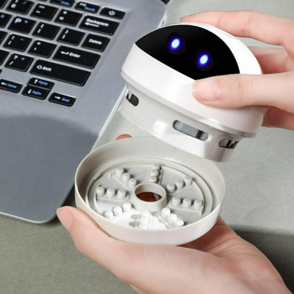 Belro compact USB mini desk vacuum cleaner robot for electronics cleaning, featuring a sleek design and portable charging capabilities.