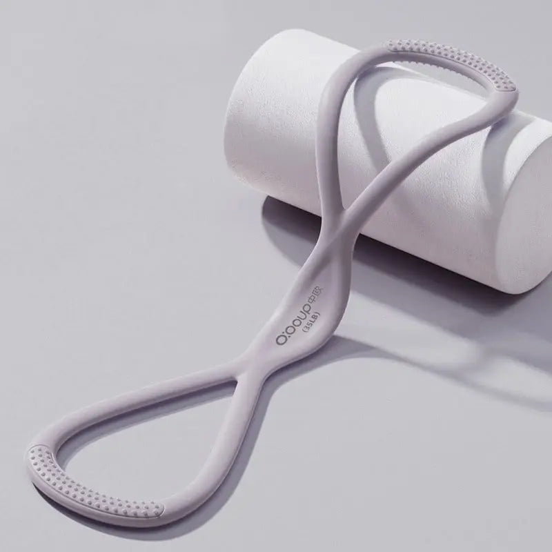 Mivoza Figure-8 resistance band for shoulder back posture correction and strength training, shown in a fitness setting.