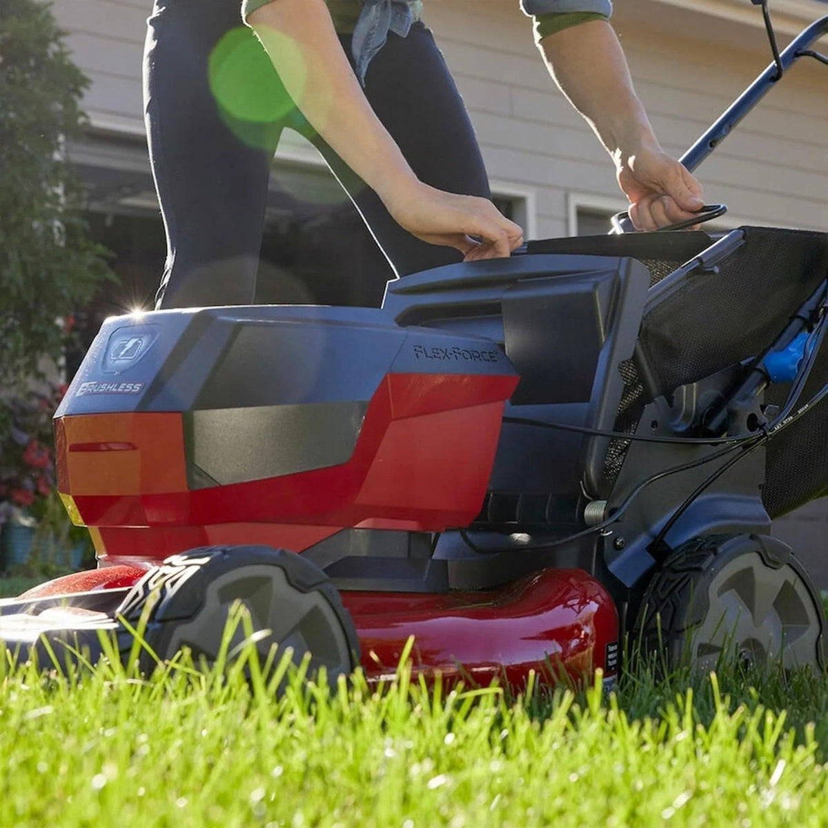 Toro 60V Recycler SmartStow 21-inch self-propelled mower with rear-wheel drive, featuring a battery and grass collection system.