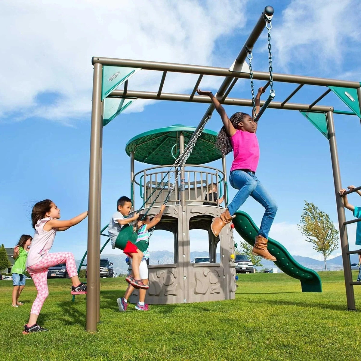 Casavibeo Lifetime Adventure Tower Deluxe playset with colorful slides, climbing walls, and a lookout tower for kids' outdoor fun.