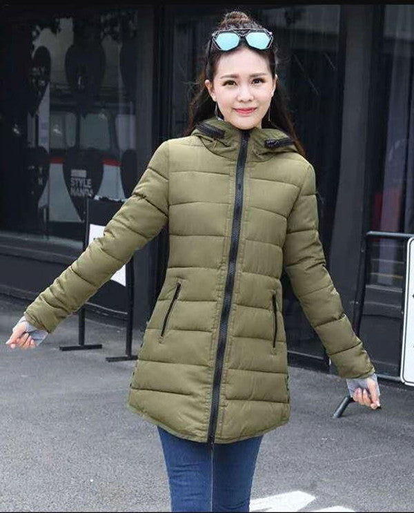 Long quilted coat for women by Belro, featuring a stylish padded winter jacket with a quilted pattern and a high collar.