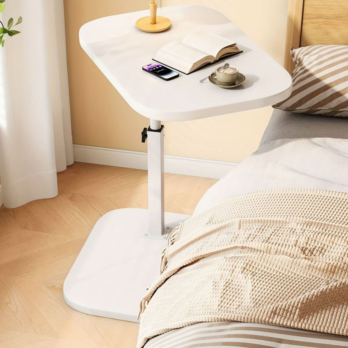 Height-adjustable Mivoza side table with wood top and metal frame, ideal for sofa or bedroom use.