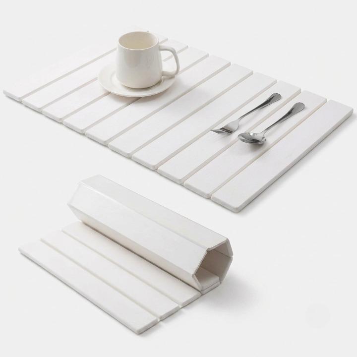 Diatomite stone dish drying mat by Mivoza, foldable and super absorbent, measuring 40×30cm for kitchen dish drying and organization.