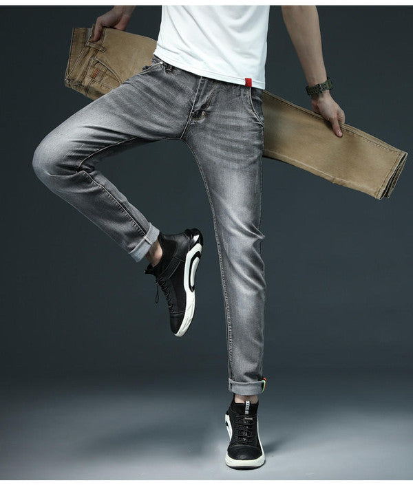 Belro Slim Denim Jeans displayed on a hanger, showcasing the classic blue color and slim fit design.