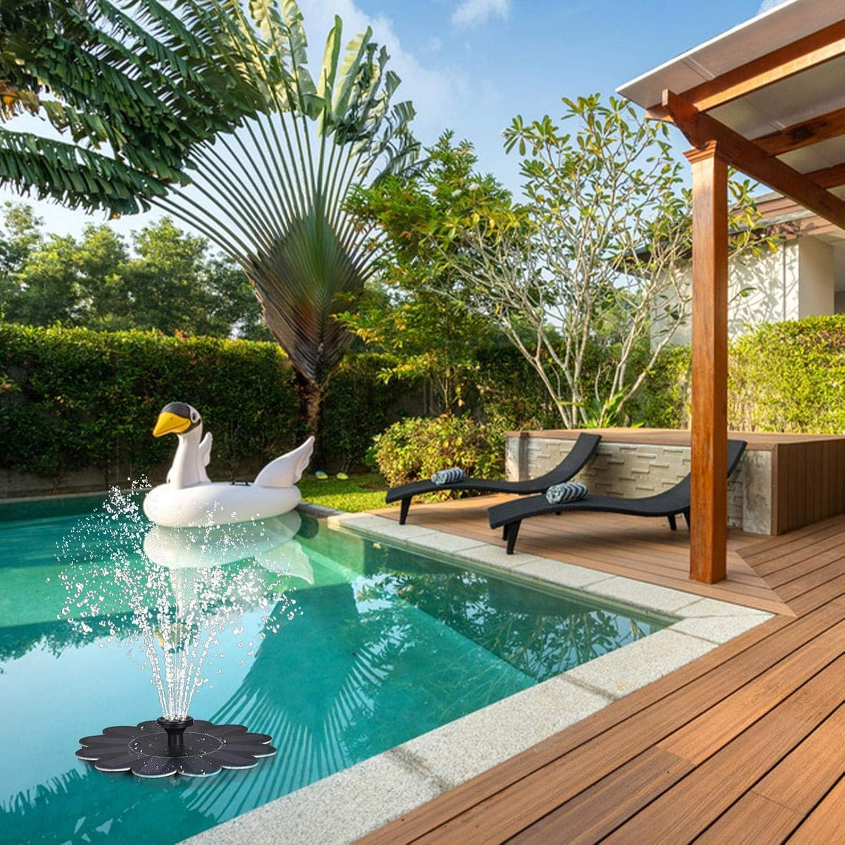 Flower-shaped water fountain for ponds and pools by Belro, showcasing the decorative floral water feature in a garden setting.