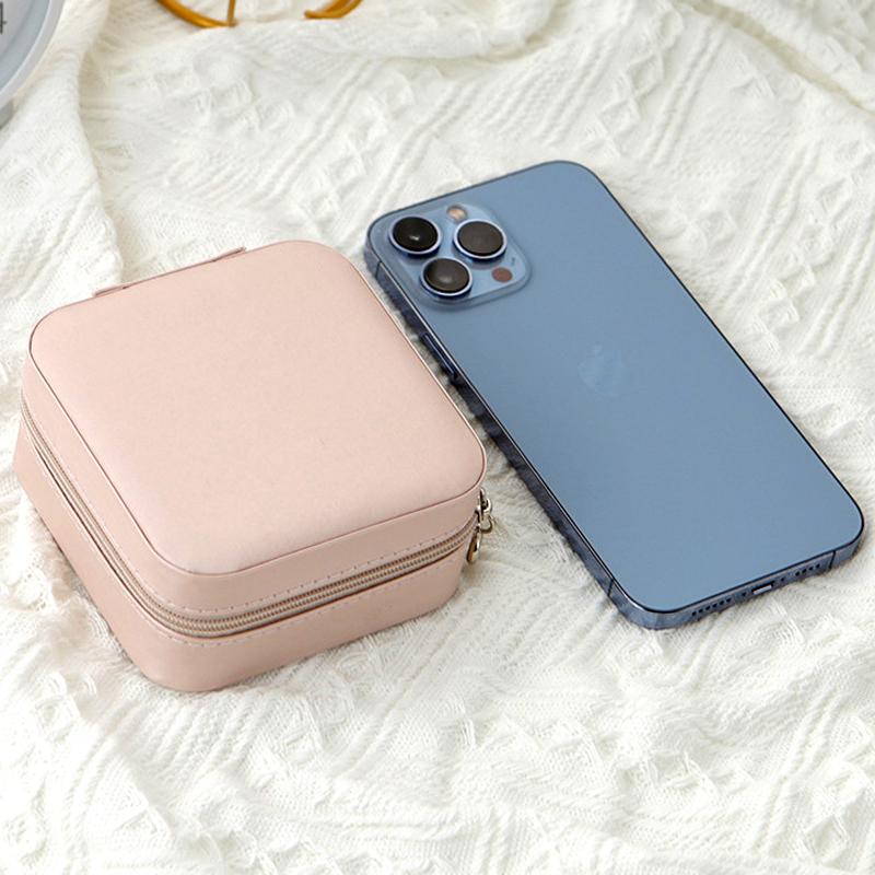 Belro travel jewelry case with multiple compartments, soft interior, and secure zipper for jewelry storage and organization.