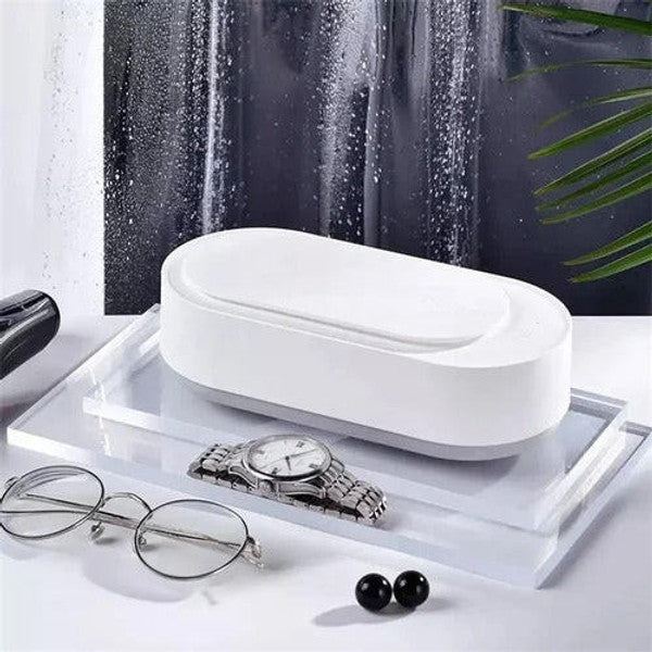 Belro portable ultrasonic cleaner for jewelry accessories, showcasing a compact device with stainless steel tank and control panel.