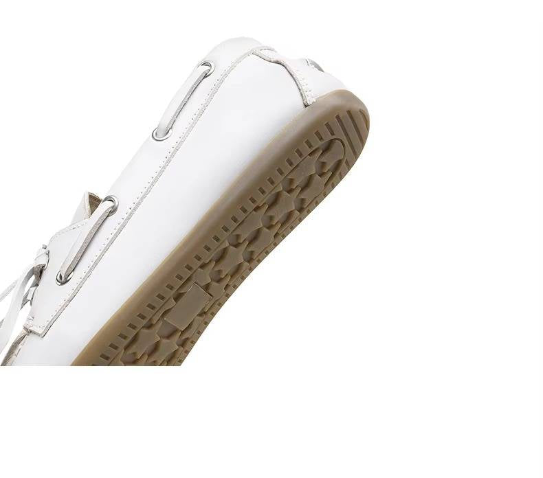 Women’s genuine leather moccasins by Belro, showcasing soft leather upper, classic slip-on design, and comfortable footwear style.