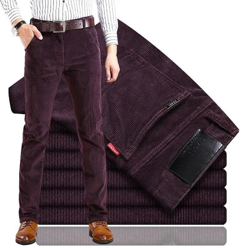 Men's Belro corduroy trousers in classic brown, showing the textured fabric and relaxed fit on a plain background.