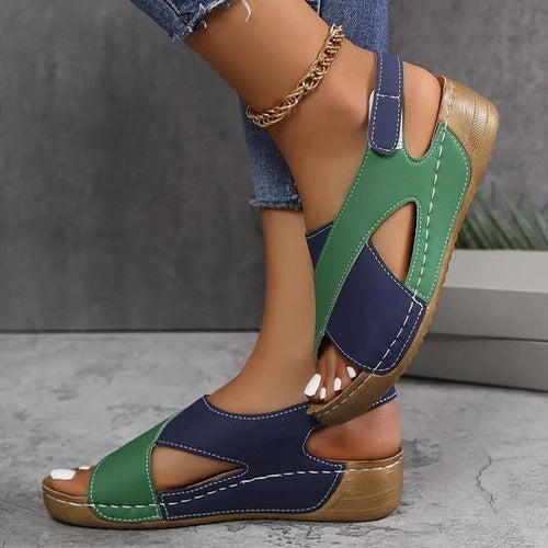 Belro ergonomic slide sandals in neutral color, featuring cushioned footbed and adjustable straps for comfortable everyday wear.