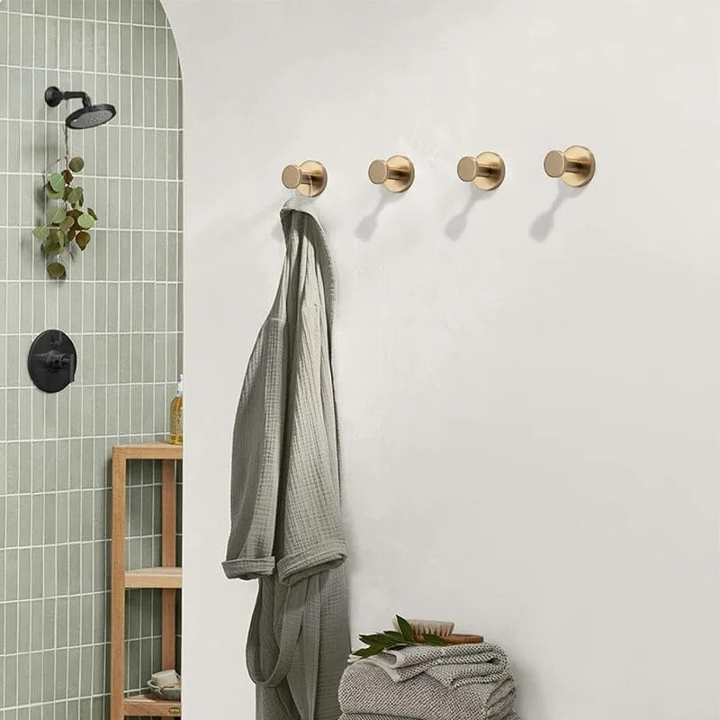Belro suction cup hooks attached to a light bulb socket, used for hanging lightweight electronics or accessories securely.