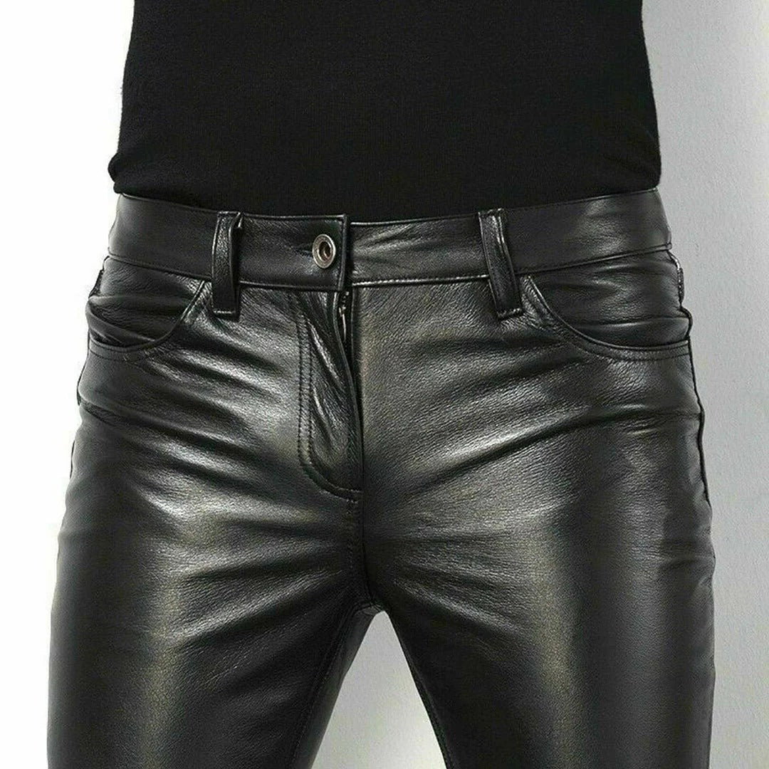 Men's leather jeans by Belro showing close-up of black leather fabric and stitching details.