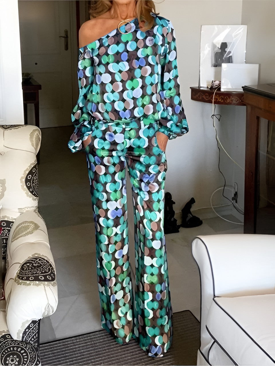 Belro geometric pattern two-piece clothing set featuring a stylish top and matching pants with bold geometric designs.