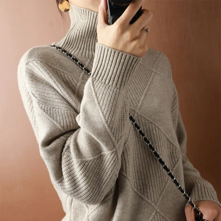 Belro knitted sweater featuring a cozy, textured design in a neutral color, perfect for casual and layered winter outfits.