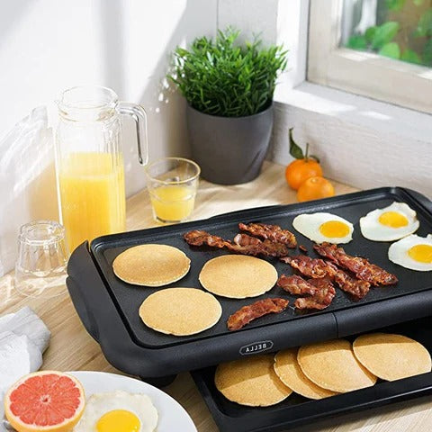 Belro large 24-inch pancake griddle maker on kitchen countertop, featuring non-stick cooking surface and control handles.