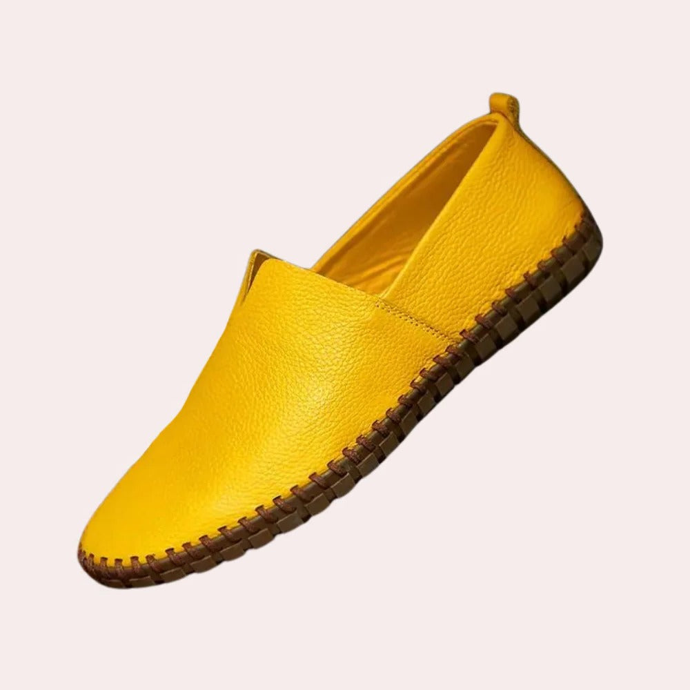 Belro men's slip-on slippers with soft fabric upper and cushioned insole, designed for comfortable indoor footwear.