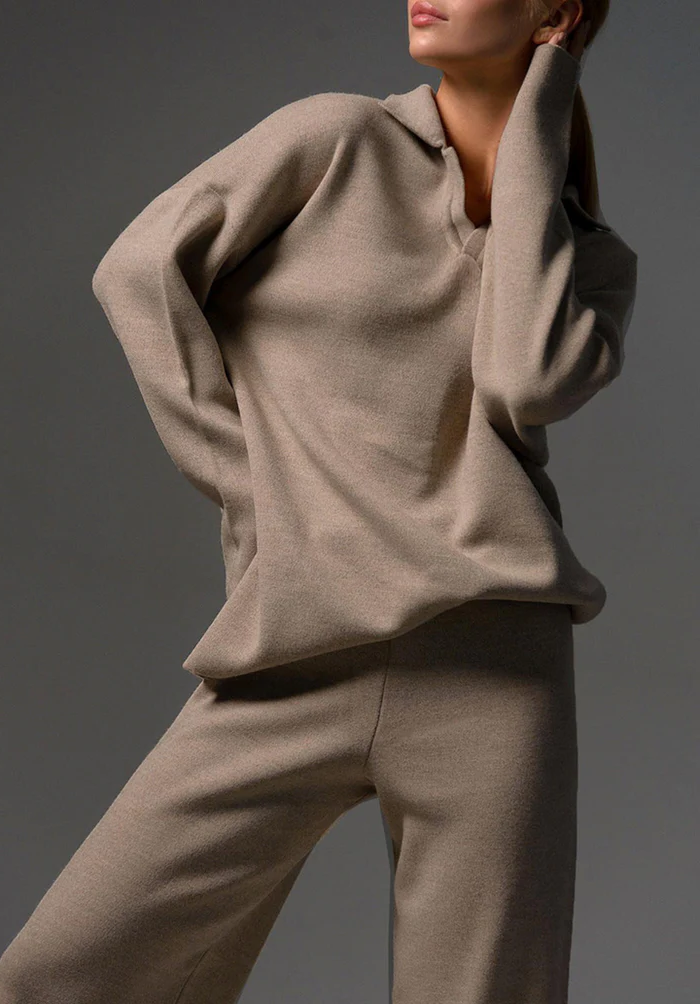 Comfortable women's pants set by Belro featuring an elegant design, shown on a model with relaxed fit and stylish details.
