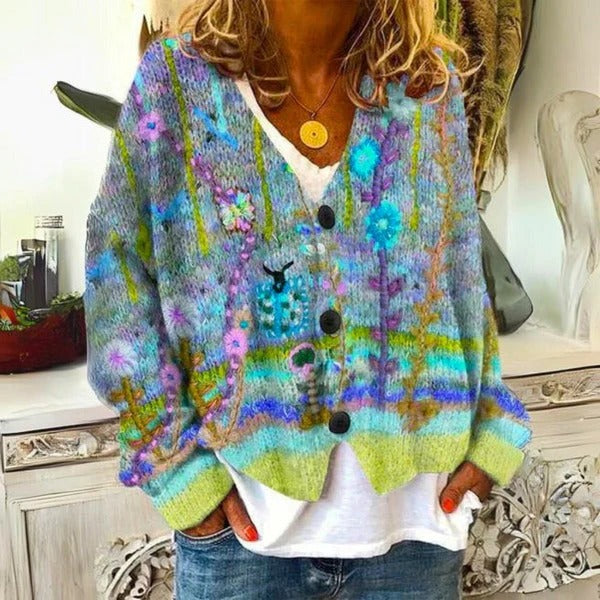 Colorful floral-patterned Belro ladies' sweater, stylish knit with vibrant flower designs on soft fabric.