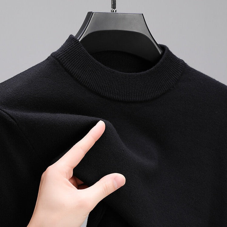 Belro men's cashmere sweater with an elegant hem, showcasing soft, luxurious fabric and stylish fit in a close-up view.