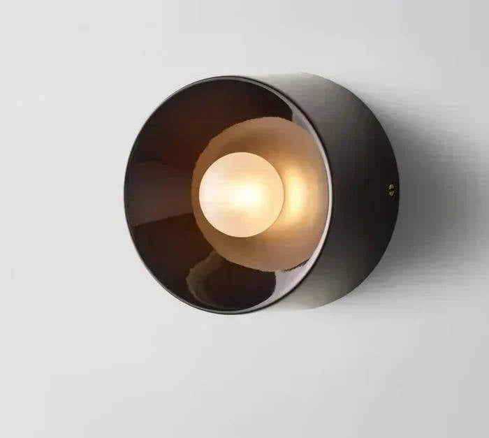 Modern black Belro Nordic wall lamp mounted outdoors, ideal for home exterior lighting and garden decor.