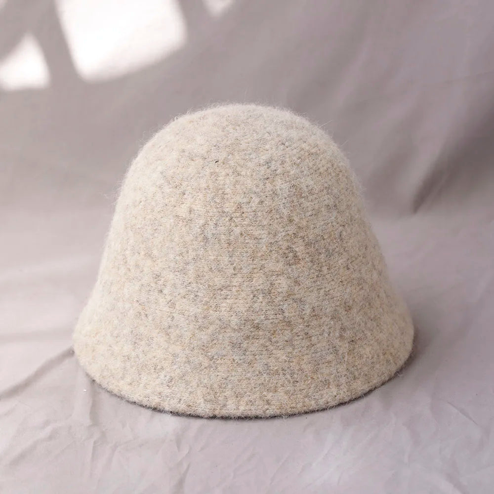 Khaki women's winter wool bucket hat by Belro, stylish accessory with a cozy, warm design for cold weather.