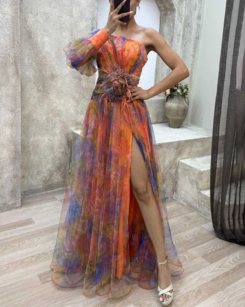 Elegant Belro dress in flowing fabric with a fitted bodice and flared skirt, perfect for formal occasions.