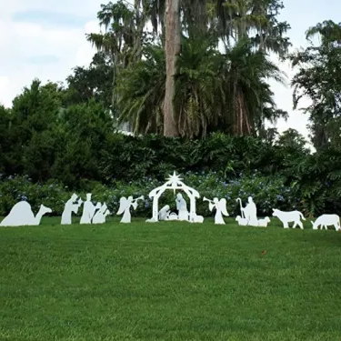 Belro Holy Night outdoor Christmas nativity set with figurines of Mary, Joseph, baby Jesus, and angels for holiday garden decor.