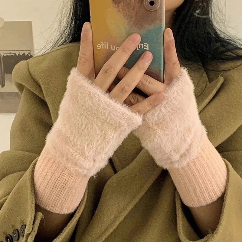 Pink plush cozy fingerless gloves for women by Belro, soft and warm clothing accessory for winter wear
