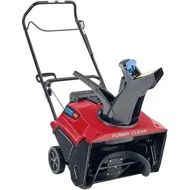 Casavibeo Toro Power Clear 721 R single-stage gas snow blower with adjustable handle and clearing chute in action.