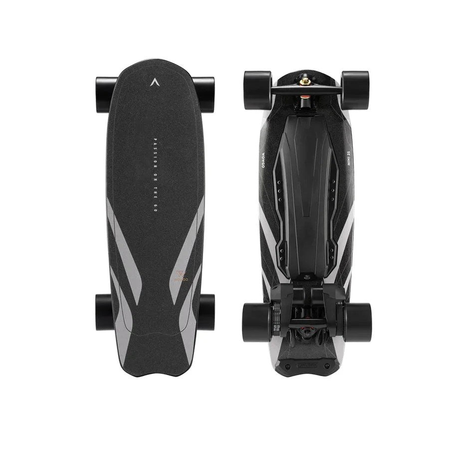 Casavibeo WowGo Mini 2S electric skateboard and shortboard with deck, wheels, and grip tape visible on a plain background.