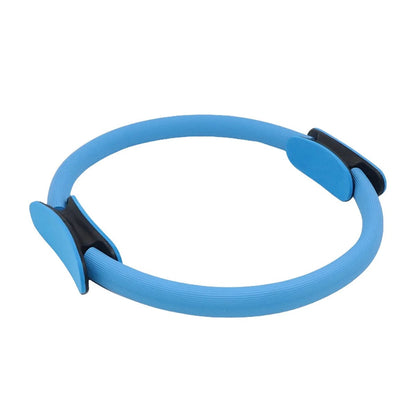 Men's black Belro Pilates Ring used in workout clothing, showing the circular resistance ring for fitness exercises.