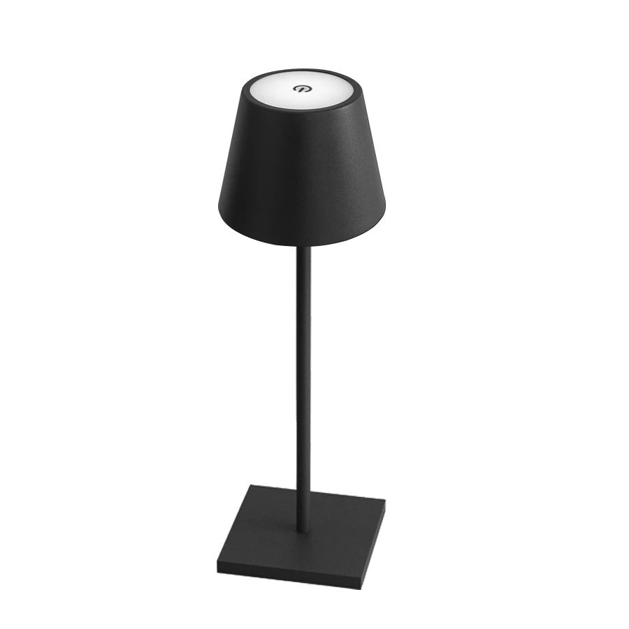 Belro bedside touch table lamp with sleek design, suitable for outdoor use in home and garden settings, illuminated on a table.