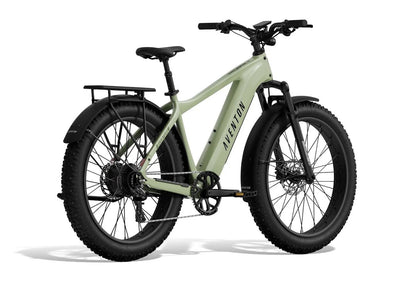 Aventon Aventure 3 electric bike in Matcha green, rear view showing frame, wheels, and rear suspension.