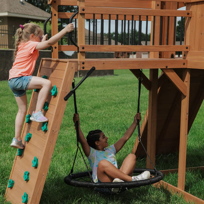 Casavibeo Sterling Point swing set with sturdy frame, colorful ropes, and a spacious seat for backyard outdoor play and adventure.