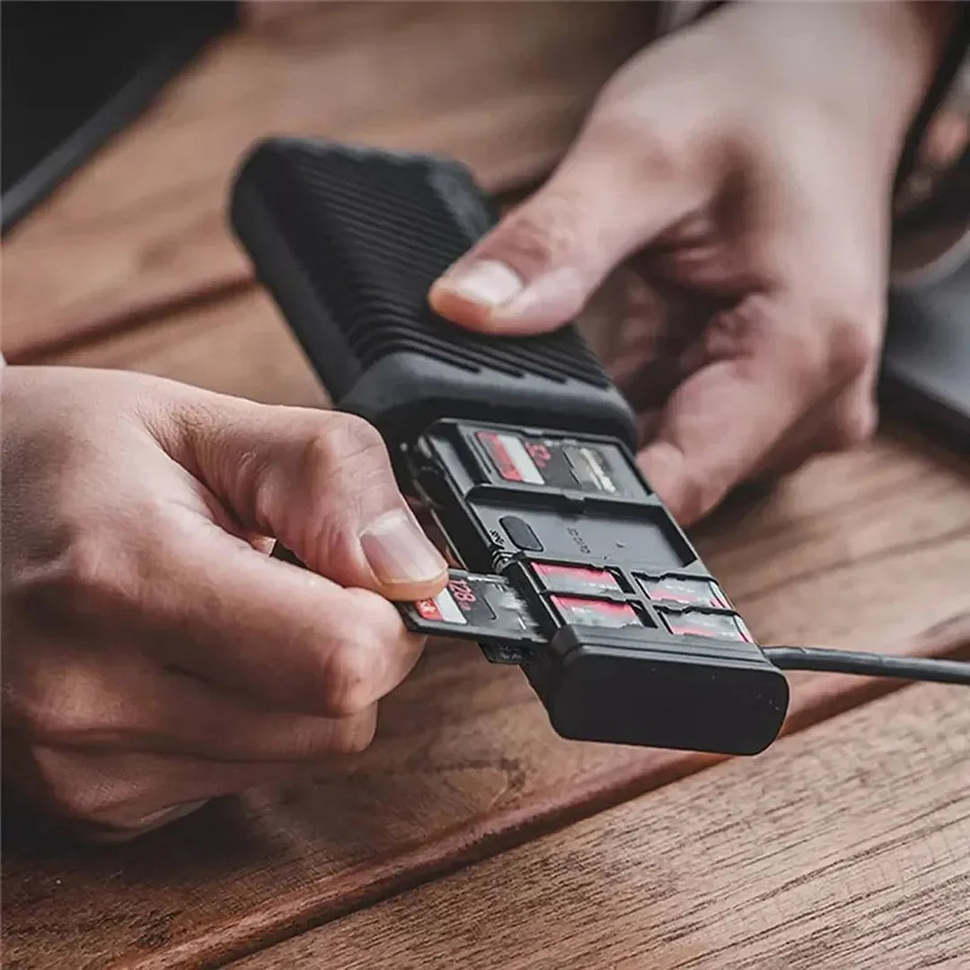 Belro Type-C SD and TF card reader connected to a computer, displaying slots for multiple memory cards in an electronic device.