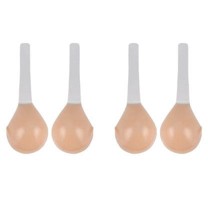 Women's BowLift invisible strapless adhesive bra with seamless low-back support, shown on a model wearing it under a backless dress.