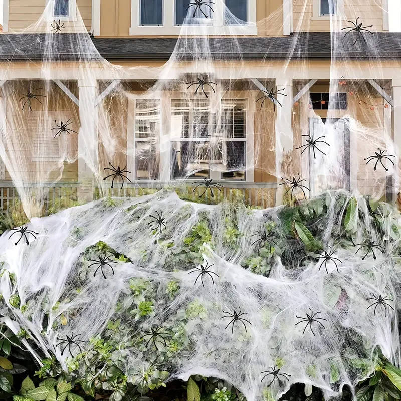 Belro Halloween door decoration with 200 sqft spider webs and fake spiders for spooky seasonal decor.