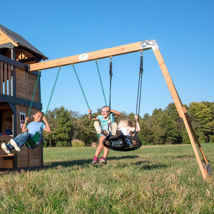 Casavibeo Canyon Creek Swing Set with two swings and slide, outdoor playset for kids with sturdy wooden frame and colorful accessories.
