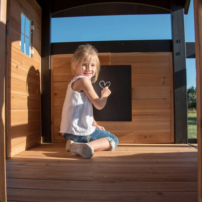 Casavibeo Canyon Creek Swing Set installed in a backyard with children playing on the swings and slide, outdoor play equipment setup