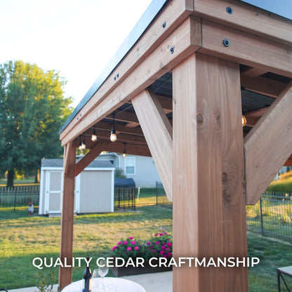 Cedar wood backyard gazebo with 12x9.5 ft Arcadia design, steel roof, and PowerPort™ for outdoor relaxation and shade.