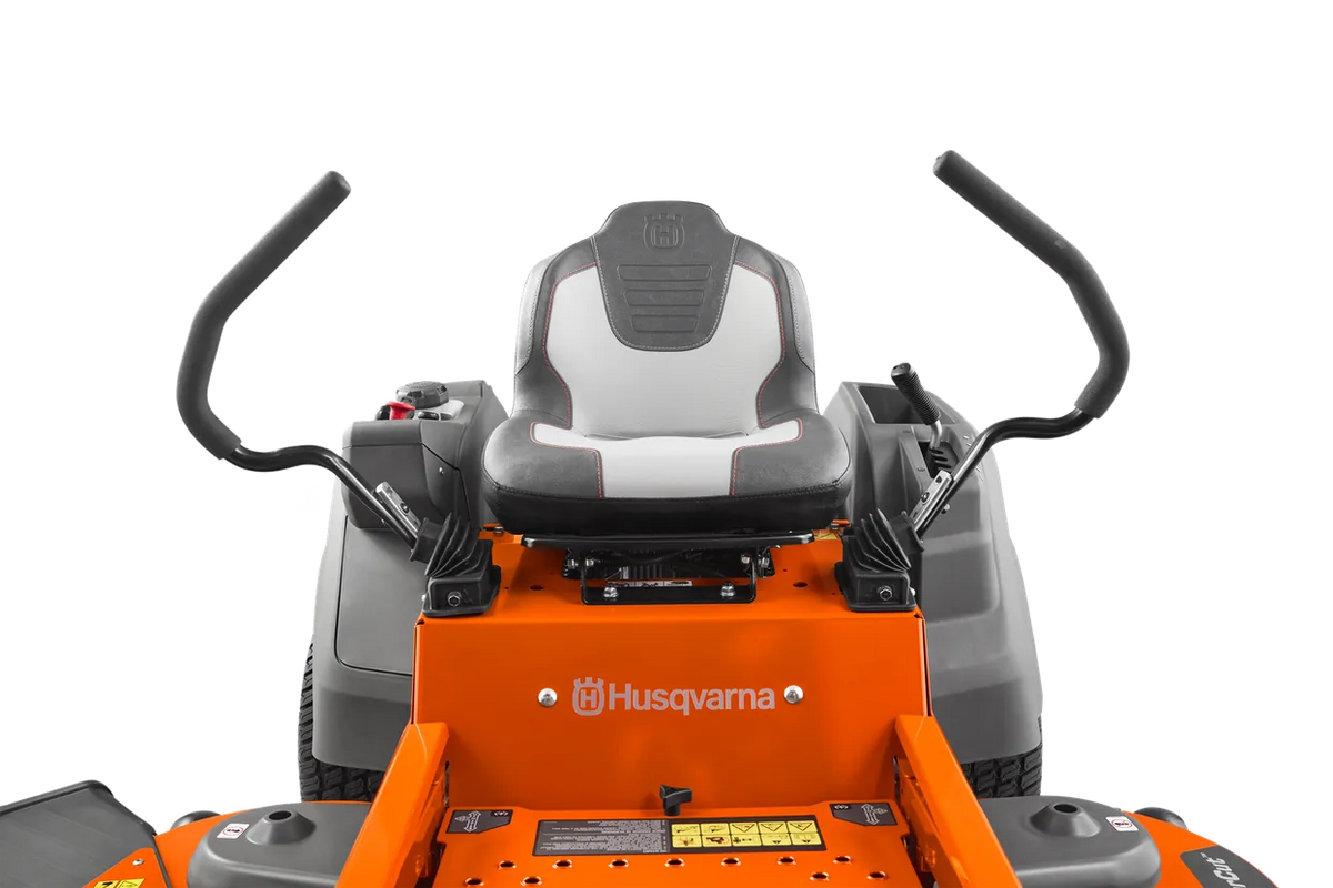 Husqvarna Z254F zero-turn riding lawn mower with 54-inch cutting deck and 24 HP Kawasaki engine, shown in use on a lawn