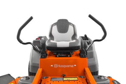 Husqvarna Z254F zero-turn riding lawn mower with 54-inch cutting deck and 24 HP Kawasaki engine, shown in use on a lawn