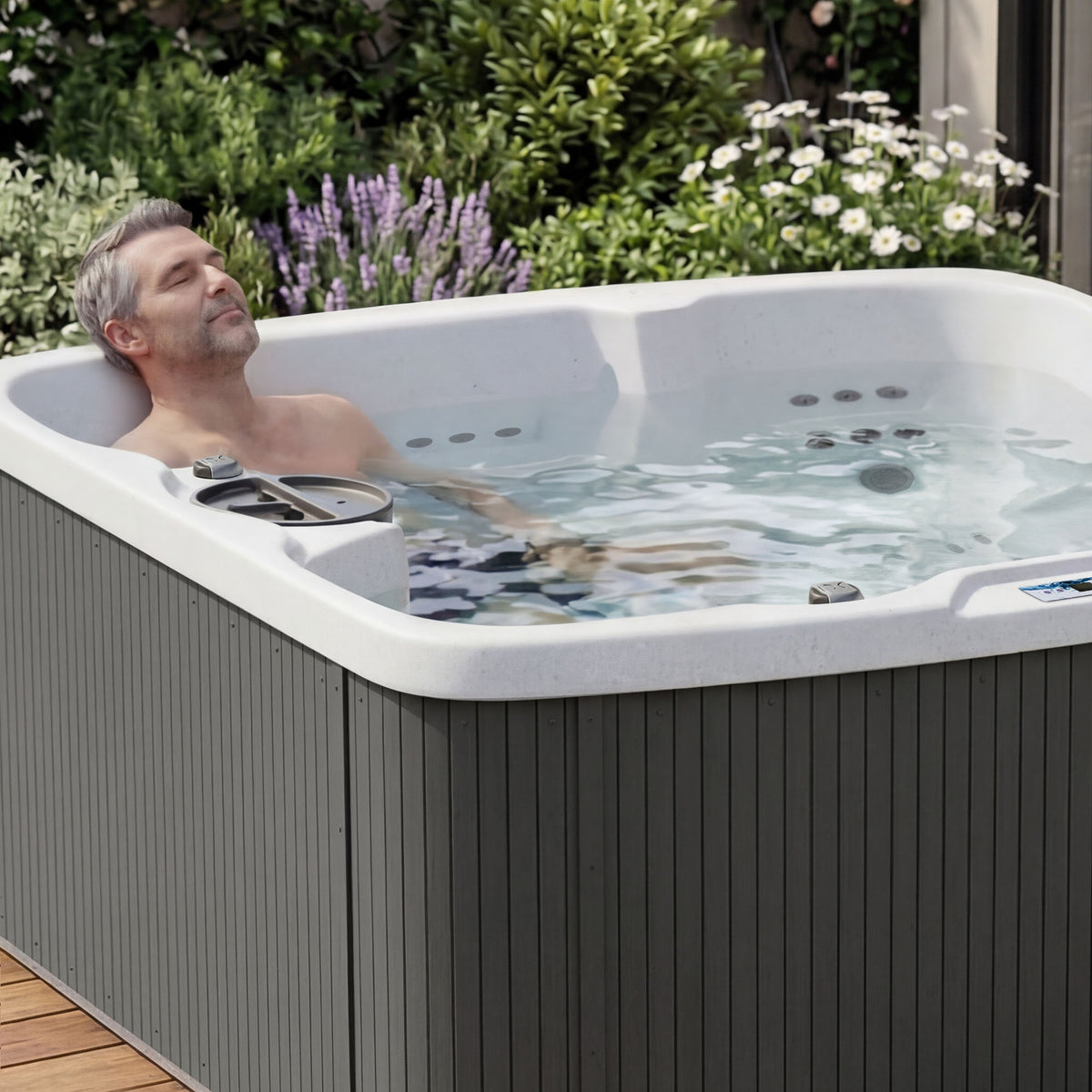 Close-up of Lifesmart Leganza 6-person spa with 90 jets, lounge seating, in coastal gray color, by Casavibeo.