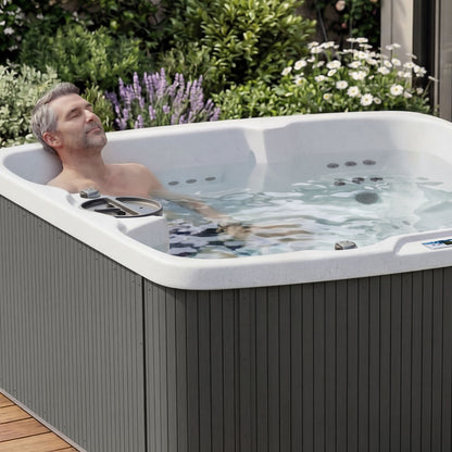Close-up of Lifesmart Leganza 6-person spa with 90 jets, lounge seating, in coastal gray color, by Casavibeo.