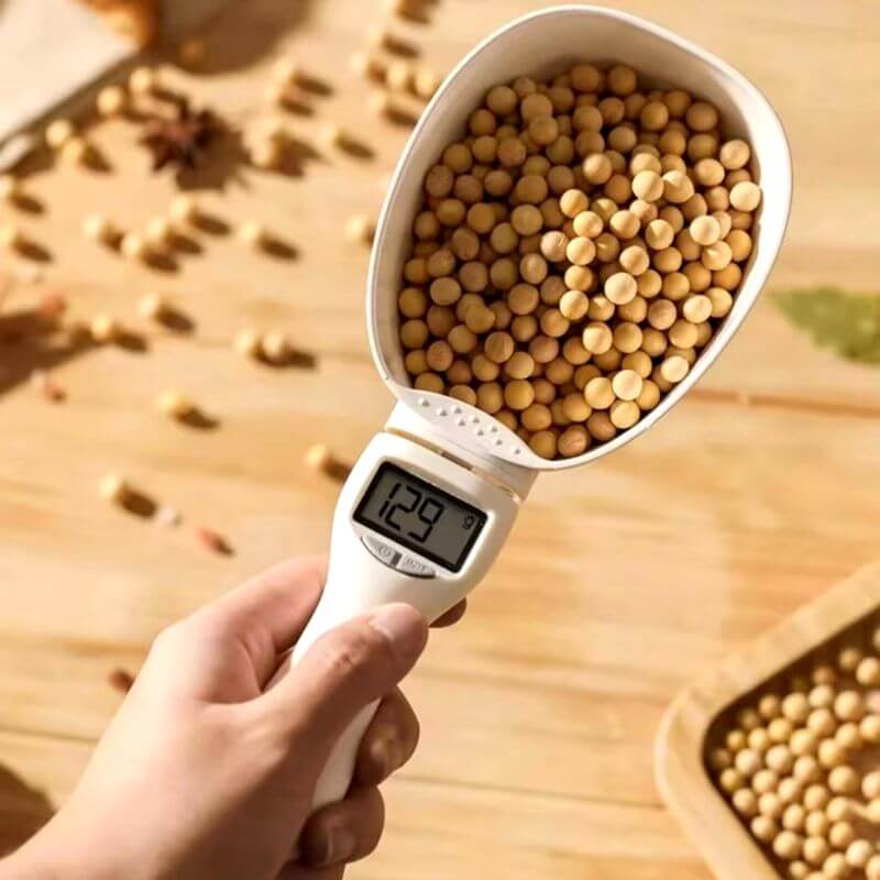 Digital measuring spoon scale by Mivoza Deutschland showing a close-up of the sleek, compact kitchen tool with digital display.